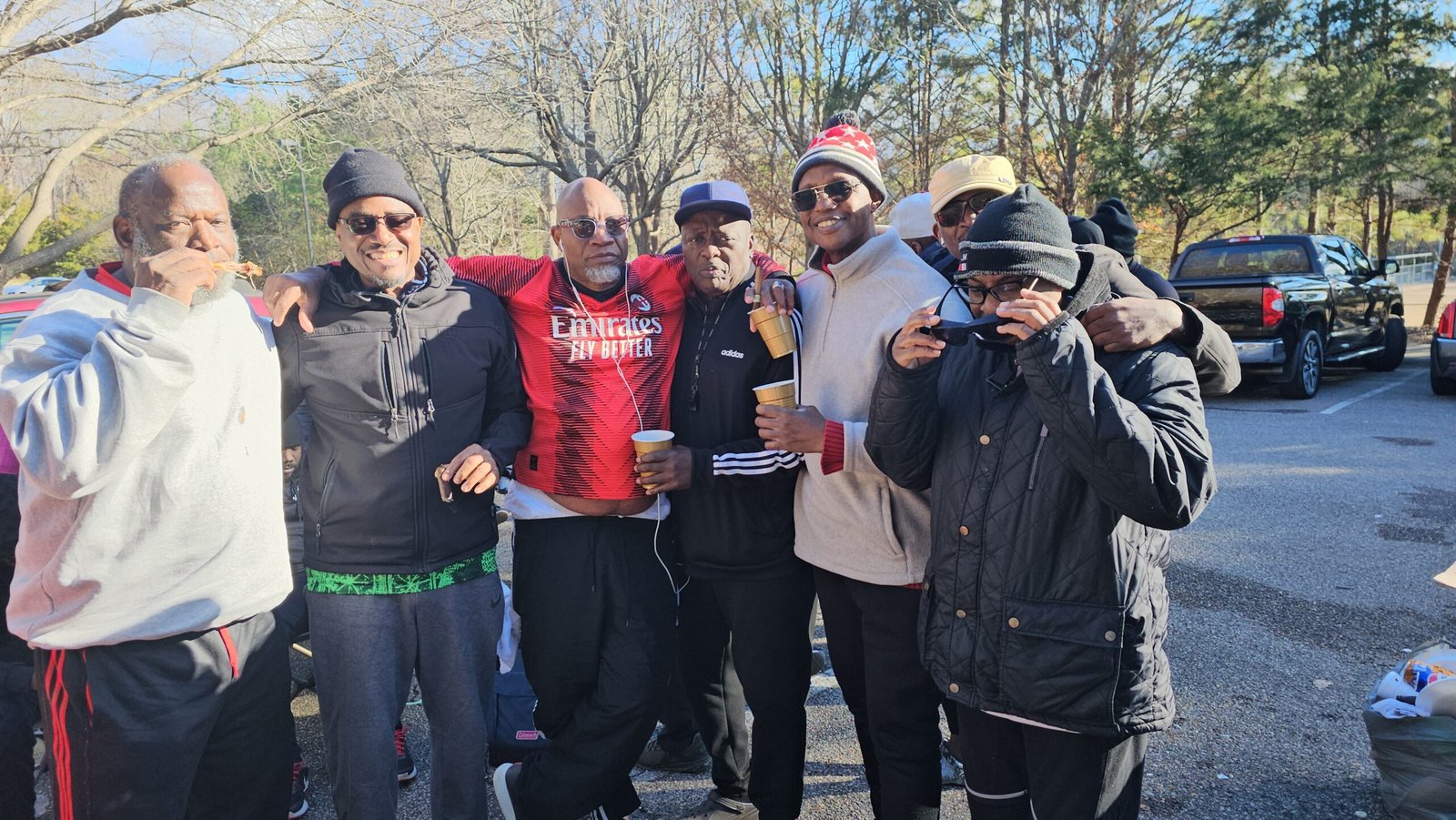 Club members standing together outdoors